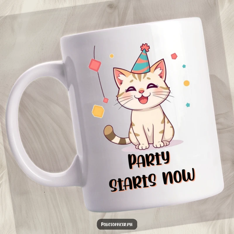 Funny party cat mug with a hat, playfully batting at shapes, embodying festive feline fun, great for gifting.
